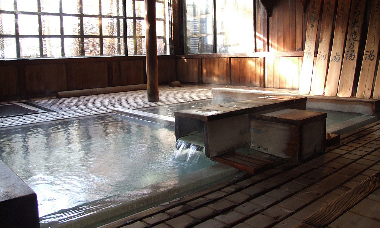 Onsen & Ryokan: traditional party wearing yukata robes at a hot springs resort