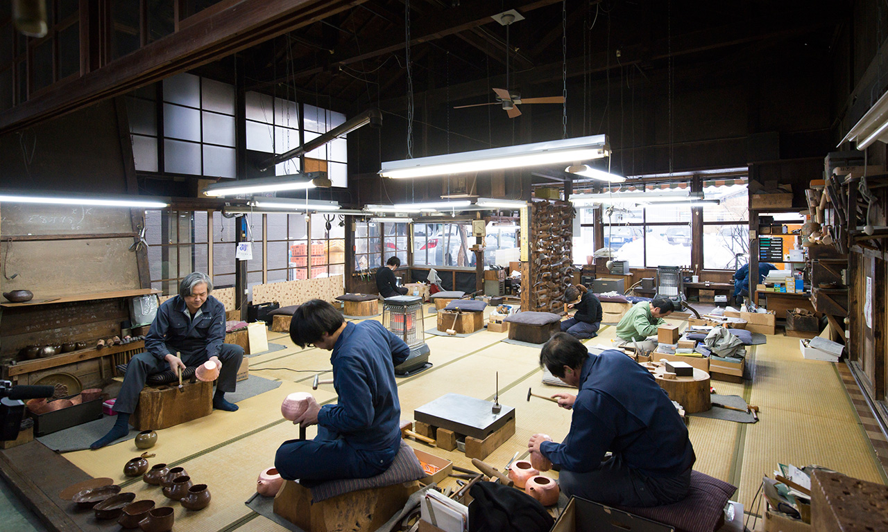 Making metal handicraft at a blacksmith workshop in Tsubame-Sanjo